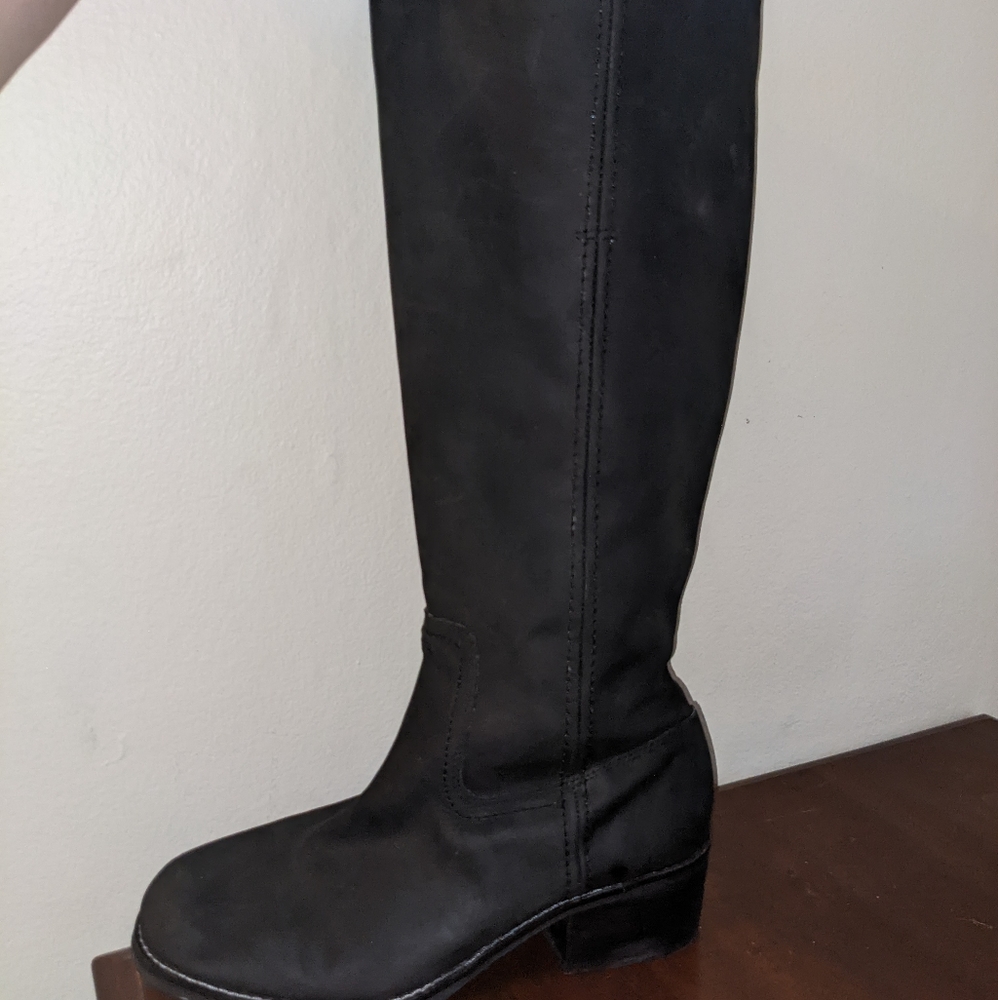Black leather knee high boots